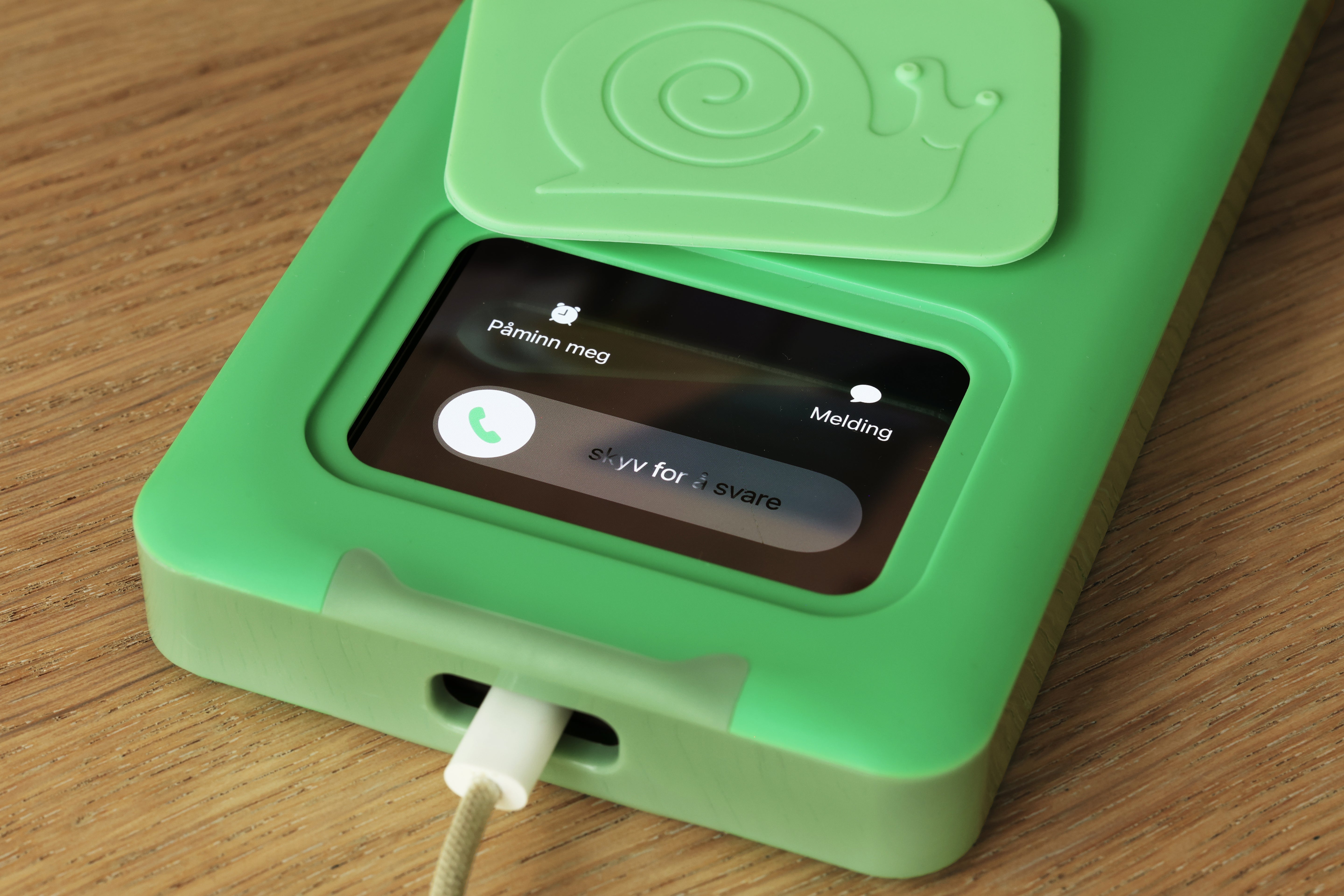 Låseboks til mobil – grønn med snegle